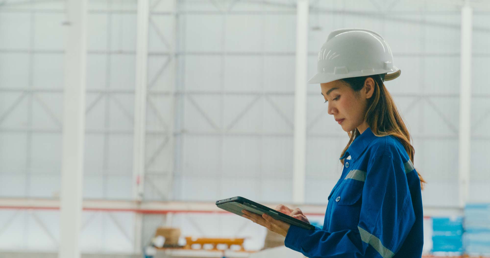 Female industrial engineer using a tablet